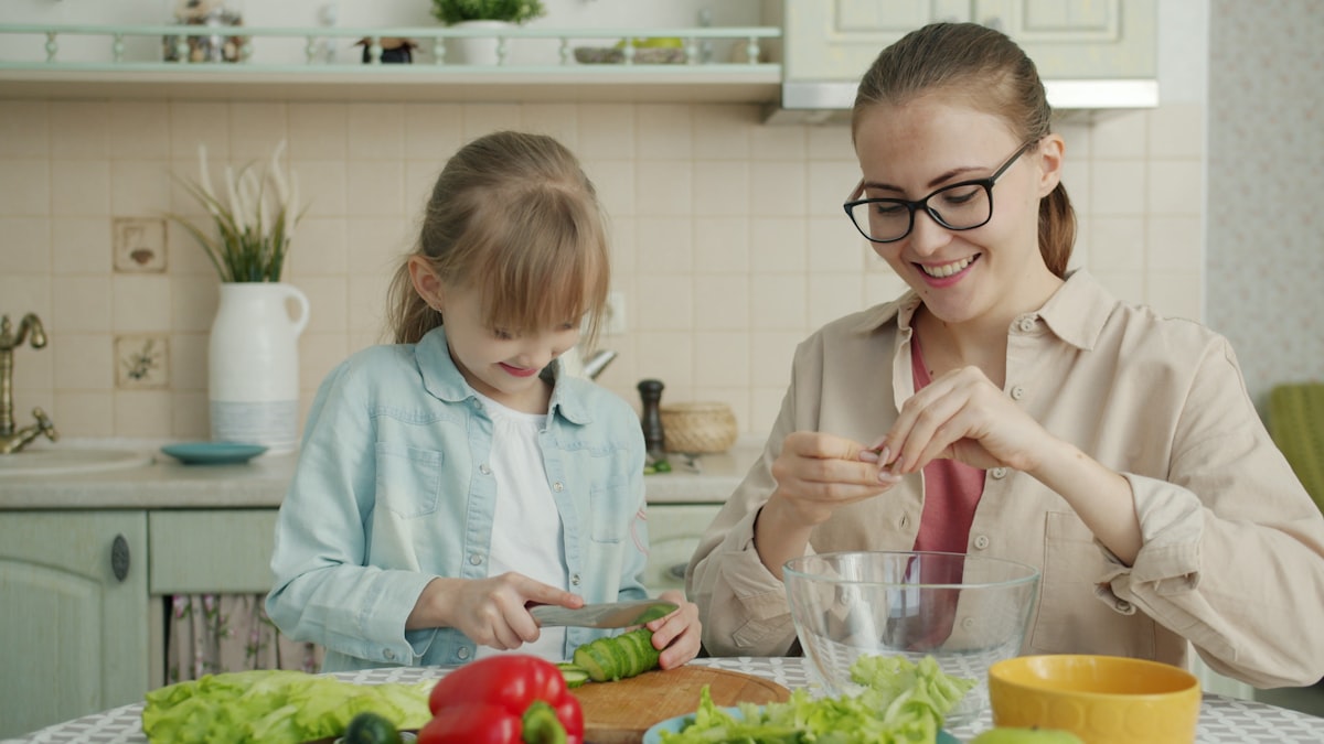 Family cooking together in kitchen